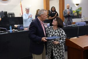 Former Madison County Commissioner Mac McCutcheon honored in Madison, presented with city coin