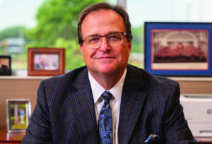 Dr. Ed Nichols honored with city coin ahead of retirement