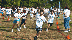 Students at Mill Creek Elementary run laps for the Maverick Mile fundraiser. (CONTRIBUTED)  