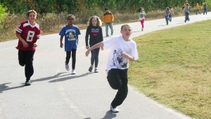 Students run laps earlier this year at Heritage Elementary School. (CONTRIBUTED) 