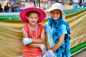 These girls enjoyed dress-up fun at the "Madison Living" booth at Madison Derby Days in 2012. (PHOTO/MADISON RECORD)