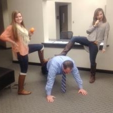 Teacher Lee Jeffreys (on floor) is 'coached' by students for Scale Back Alabama. (CONTRIBUTED) 