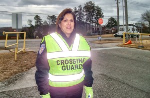 At Discovery Middle School, Carrie Sanders works as a crossing guard, clerical aid and gardener. (CONTRIBUTED) 