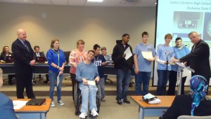 James Clemens Jets, Special Olympics team players are Courtney Wesier, coach Shannon Humphrey, David Brooks (seated), Matthew Moxley, Malik McClendon, Chris Wessling, Henry Trammell and Chris Pate. Not pictured are Michael Sledge, Ryan James, Jacob Sievers, Corvelle Kennedy and Allen Clay. (RECORD PHOTO/GREGG PARKER) 