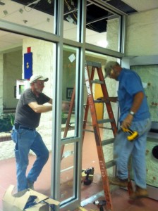 Workers with North Alabama Glass Company installed security doors at Heritage Elementary School on April 17. (CONTRIBUTED)