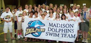 Swimmers with the Madison Dolphins celebrate after their wins at the Alabama Sports Festival in Birmingham. (CONTRIBUTED) 