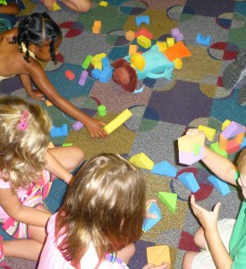 Youngsters at the Astro Summer Camp at Columbia Elementary School engage in a building activity. (CONTRIBUTED) 