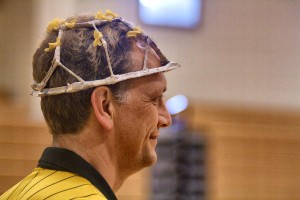 During a DI competition, coach John Hood wears a cap fashioned from pasta noodle and newspaper. (CONTRIBUTED)