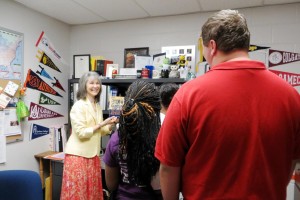 Sheila Roberts, left, offers a book with college interview tips to Bob Jones students. (CONTRIBUTED) 