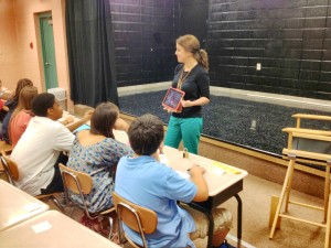 Courtney Elrod, standing, teaches digital communication and drama at Liberty Middle School. (CONTRIBUTED) 