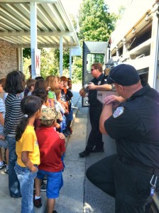 Madison firefighters explain the Safehouse to Madison students. (CONTRIBUTED)  