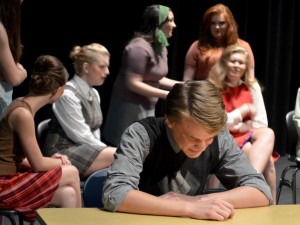 In "Phobiology," the constable Spencer Shafer endures the rabble from actors Abbie Chatelain, from left, Madison Johnson, Lexi Mecikalski, Jessi Hicks and Kylie Thorum. (PHOTO/KAITLIN RUNNELS)
