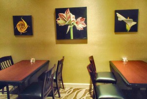 Trina Hunter's art at Fresh Traditions includes a yellow rose, an amaryllis and a white calla lily. (CONTRIBUTED)