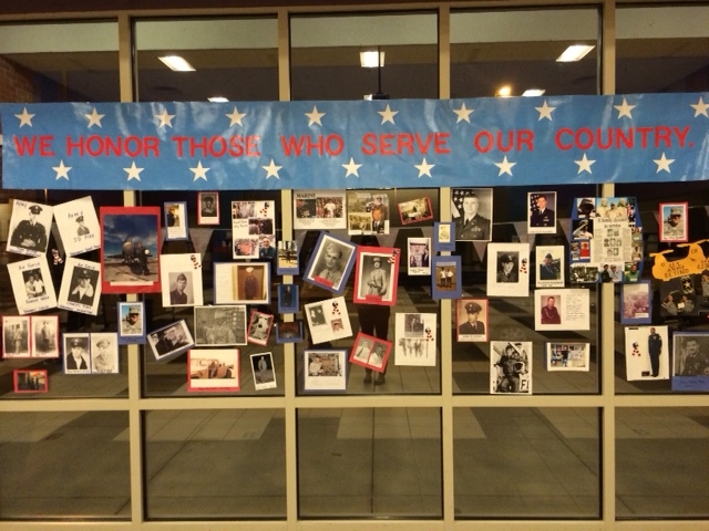 Mill Creek's Wall of Honor includes soldiers' photos and students' definitions for "America in Six Words." (CONTRIBUTED) 