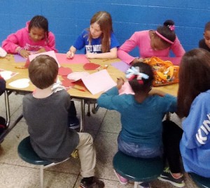 West Madison students busily work on valentines for Madison Manor residents and their mothers. (CONTRIBUTED) 