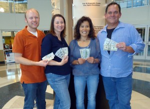 Shea and Sarah Brewer, at left, and Doug and Sup Fravel each won $500 in Meltdown Mania at Hogan Family YMCA. (RECORD PHOTO/GREGG PARKER