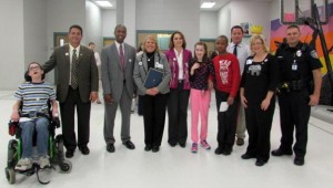 Helping proclaim Autism Awareness Month were Liberty student Drew Daniel, from left, Mayor Troy Trulock, Liberty Principal Nelson Brown, Autism Society of Alabama representative Debbie Bumbicki, Liberty Assistant Principal Sylvia Lambert, Liberty students Correna Carden and Kollin Burkett, special education coordinator Jamie Hill, Stacey Greenhaw with The Cardinal School of Huntsville and Liberty Special Resource Officer Jason Bolden. (CONTRIBUTED) 