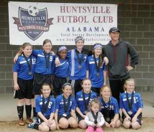 North Alabama United Stars members are Rebecca Adkins, front from left, Sophia Smith, Maddie Moore, Nikki Clark and Hayden Clift, back from left, Maggie Lee, Brooke Tate, Briyana Clark, Danielle Brouillette, Julianna Taylor and coach J.T. Taylor.  Not pictured are Jessica Dodson, Kennedy Jackson, Taylor Troutt and assistant coach Jennie Gibson. (CONTRIBUTED)  