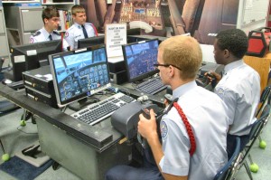JROTC students using flight simulation software in their study of the Doolittle Raid are Jonah Jenkins, from left, Nickolas Simmons, Christian Weiss and Richard Carr. (CONTRIBUTED) 