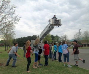 During Space Week, a firefighter from Madison Fire and Rescue Department dropped water balloons that Horizon sixth-graders had shielded with protective casings. (CONTRIBUTED) 