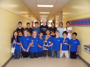 Math team members at Madison Elementary School proudly show their enthusiasm after winning trophies in this year's contests and tournaments. (CONTRIBUTED) 