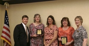 Sen. Bill Holtzclaw congratulates Madison City Council of PTAs treasurer Lenore Clark-Sieg, from left, president Sonja Griffith, secretary Amy Moore and national president-elect Laura Bay at the 96th annual Alabama PTA convention. (CONTRIBUTED) 