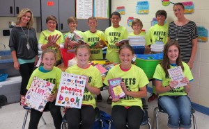Fellowship of Christian Athletes members and sponsors at Columbia Elementary School organize supplies for South Lincoln Elementary School. Helping with the drive are Chelsey Comer, front from left, Maddie Moore, Taylor Troutt and Sarah Spitzmiller and teacher Miranda Bolden, back from left, Connor Cantrell, Eli Bolden, Braden Cobb, Ben Petty, Kody Shively, Stuart Edge and teacher Savannah Demeester. (CONTRIBUTED) 