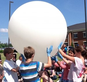 Fifth-grade science students at Mill Creek Elementary School prepare to launch their weather balloon. (CONTRIBUTED) 