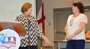 At a recent Madison Board of Education meeting, Rainbow Elementary School Principal Dorinda White, at left, introduces Angie Bush as assistant principal in charge of Madison City Schools Pre-Kindergarten Center. (CONTRIBUTED) 