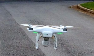 A drone takes flight from a neighborhood street to take photos of a real estate holding in Huntsville. (CONTRIBUTED) 