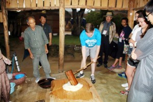 Allen King (with mallet) pounds cooked rice to make rice cakes in Yeongju, South Korea. He participated with the Alabama-Korea Educational Exchange Program (A-KEEP). (CONTRIBUTED) 