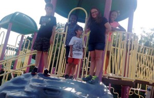Students in the Columbia Astros Extended Day program enjoy free time on the school playground. (CONTRIBUTED) 