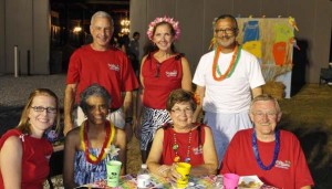 Rotary Club of Madison presented Parrots of the Caribbean on Aug. 23 at The Barn, 58 Martin St. Rotarians in their island regalia are Amy Patel, front from left, Dianne Reynolds, Pat Cross, Roger Cross, and Marc Jacobson, back from left, 2014 Parrots chairman Debbie Overcash and Jim Reynolds. (RECORD PHOTO/NICK SELLERS) 