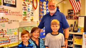 Mill Creek Elementary School students Jack Willis and Wyatt Willis will welcome their grandparents, Terri Bennett, seated, and George Bennett, standing, for Grandparents Week. (CONTRIBUTED)  