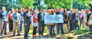 Huntsville Mayor Tommy Battle, Torch Technologies Chairman/CEO Bill Roark, Community Foundation CEO/President Stuart Obermann and numerous employees attended the announcement for the Community Catalyst Fund. (CONTRIBUTED) 