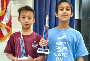 Sixth-grader Joshua Lin, at left, from Madison Elementary School and fifth-grader Om Badhe from Mill Creek Elementary School were top prize winners in the first annual Madison City Schools Fall Scholars Chess Tournament. (CONTRIBUTED) 
