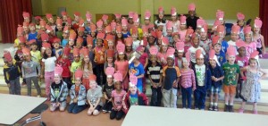 Making apple hats was just one of the fun aspects of the kindergartners' Apple Feast at Heritage Elementary School. (CONTRIBUTED) 