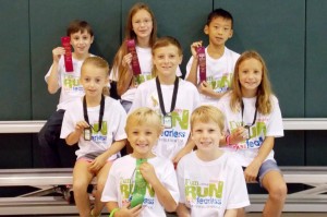 Madison Elementary School students earning places in the Huntsville Hospital Fun Run were Cullen White, front from left, and Jackson Pickering; Audrey Pangboor, middle from left, Jackson Hellums, and Carley White; Seth Kulavich, top from left, Alaina Burnham and Joshua Lin. (CONTRIBUTED) 