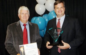 Bob Goff, at left, and John Allen with Southern Construction & Design Inc. receive the 2014 Torch Award for Marketplace Ethics from the Better Business Bureau of North Alabama Inc. (CONTRIBUTED) 