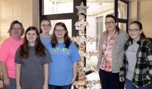 Student 2 Student (S2S) members who helped with the Christmas Giving Tree at Liberty Middle School include sponsor Benita Tunstill, from left, Emily Mefford, Isabel Korty, Randi Greene, faculty member Janette Courtney and Sarah Kate Woosley. (CONTRIBUTED) 