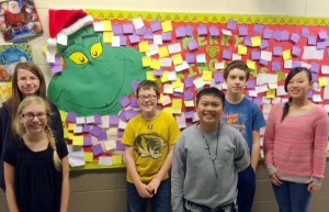 Sixth-graders at Mill Creek Elementary School posted their 'good deeds' to a bulletin board during "The 25 Days of Grinchmas." (CONTRIBUTED) 
