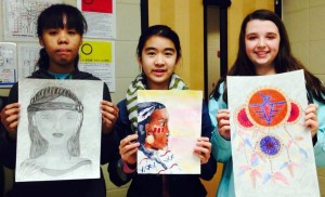 Winners from Discovery Middle School in the Native American Heritage Month art contest are Shiyeon Ku, from left, second place; Victoria Lee, first; and Anna Mitchell, third. (CONTRIBUTED) 