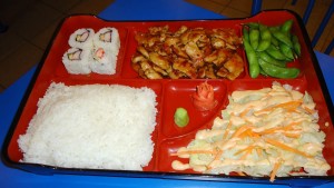 Red Fish's Bento Box with chicken teriyaki includes a tossed salad, white rice, California roll and edamame beans. (RECORD PHOTO/GREGG PARKER) 