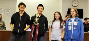 Joey Li, from left, Anthony Zhu, Ada van der Zijp-Tan and Amelia Goldston, who are members of the Bob Jones Math Team, are happy to receive their first-place trophy at the Collierville High School Math Bowl in Collierville, Tenn. (CONTRIBUTED) 