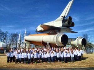 Participants at the 2014 Rotary Youth Leadership Awards stand by the space shuttle at the U.S. Space & Rocket Center. This year's conference will be held on Jan. 29-31. (CONTRIBUTED) 