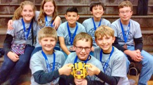 Heritage's Patent Protectors Robotics Team proudly wears their first-place medals as winners in robot programming. (CONTRIBUTED) 