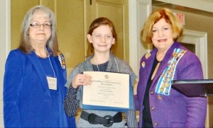 Madison Academy fifth-grader Lindsey Lee Cunningham, at center, received an American History essay award from the Huntsville chapter of Daughters of the American Revolution. Presenting the award are chapter regent Wilma Stone, at left, and history chairman Martha Ann Whitt. (CONTRIBUTED) 