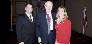 Madison Mayor Troy Trulock, at left, and Dana Trulock, at right, visit with Claes Nobel at the International Services Council of Alabama's 50th-anniversary gala. Mayor Trulock received the Thomas Pickens Gates Award. (CONTRIBUTED) 