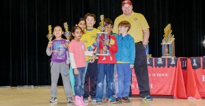 Heritage Elementary School's Chess Team competing at the 2015 Bishops Bash XIV Scholastic Chess Tournament included Chris Zheng, from left, Oviya Gowder, Madhushalini Balaji, Patrick Yoon, Vallabh Busetty, William Ryals and Coach Noel Newquist. (CONTRIBUTED) 