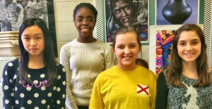 Discovery Middle School art students Tiffany Wu, from left, Joy Onawola, Ambra Cave and Isabella Guerra were winners in an art contest sponsored by Rosie's International. (CONTRIBUTED) 